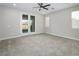 Main bedroom with access to a private patio and ceiling fan at 1348 Mariposa Way, Mesquite, NV 89027