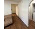 Light and bright entryway with wood-look flooring and access to laundry area at 2200 S Fort Apache Rd # 1207, Las Vegas, NV 89117