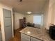 Kitchen with granite countertops and light gray cabinets at 2200 S Fort Apache Rd # 1207, Las Vegas, NV 89117