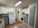 Kitchen area with granite countertops and white appliances at 2200 S Fort Apache Rd # 1207, Las Vegas, NV 89117