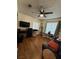 Living room features hardwood floors and a ceiling fan at 2200 S Fort Apache Rd # 1207, Las Vegas, NV 89117