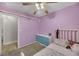 Bright bedroom with a bed, dresser, and access to the bathroom at 341 Oak Canyon Dr, Henderson, NV 89015