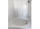 Clean bathroom with a large, round bathtub at 3615 American Pie Ct, Las Vegas, NV 89129