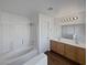 Bathroom features a tub, shower, and double vanity at 3615 American Pie Ct, Las Vegas, NV 89129