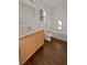 Bathroom with wood cabinets, a bathtub, and tile floor at 3615 American Pie Ct, Las Vegas, NV 89129