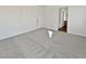 Empty bedroom with gray carpeting and neutral walls at 3615 American Pie Ct, Las Vegas, NV 89129