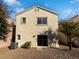 Two-story house with a backyard and gravel landscaping at 3615 American Pie Ct, Las Vegas, NV 89129