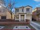 Two-story house with attached garage and small front yard at 3615 American Pie Ct, Las Vegas, NV 89129