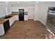 Modern kitchen with wood countertops and tile floors at 3615 American Pie Ct, Las Vegas, NV 89129