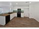 Modern kitchen with wood countertops and tile floors at 3615 American Pie Ct, Las Vegas, NV 89129