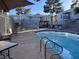 Community pool with surrounding patio furniture at 3823 S Maryland Pkwy # P6, Las Vegas, NV 89119