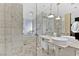 Spa-like bathroom with marble tile and double sinks at 4381 W Flamingo Rd # 3519, Las Vegas, NV 89103