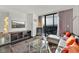 Modern living room with floor to ceiling windows and city views at 4381 W Flamingo Rd # 3519, Las Vegas, NV 89103