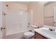 Clean bathroom with tub and wood vanity at 5044 Droubay Dr, Las Vegas, NV 89122