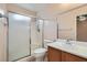 Bathroom with shower/tub combo and wood vanity at 5044 Droubay Dr, Las Vegas, NV 89122