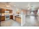 Kitchen features oak cabinets, tile floors, and a breakfast bar at 5044 Droubay Dr, Las Vegas, NV 89122