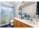 Bathroom with double vanity, shower, and toilet at 585 Dairy Creek Ave, Las Vegas, NV 89183