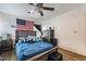 Bright bedroom with a queen bed, dresser, and ceiling fan at 585 Dairy Creek Ave, Las Vegas, NV 89183