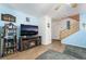 Living area featuring a fireplace and a large TV at 585 Dairy Creek Ave, Las Vegas, NV 89183