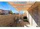 Covered patio with seating and surrounding walls at 585 Dairy Creek Ave, Las Vegas, NV 89183