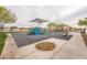 Community playground with shaded play structure, swings, and benches at 585 Dairy Creek Ave, Las Vegas, NV 89183