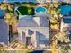 Overhead view of house, pool, and surrounding landscape at 6336 San Gagano Ave, Las Vegas, NV 89131