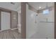 Bathroom with walk-in shower and built-in bench seating at 6336 San Gagano Ave, Las Vegas, NV 89131