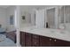 Bathroom with double vanity and dark brown cabinets at 6336 San Gagano Ave, Las Vegas, NV 89131