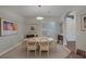 Bright dining room featuring an oval table and neutral decor at 6336 San Gagano Ave, Las Vegas, NV 89131