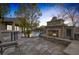Stone fireplace and patio furniture in backyard at 6336 San Gagano Ave, Las Vegas, NV 89131