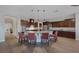 Spacious kitchen with an L-shaped island and stainless steel appliances at 6336 San Gagano Ave, Las Vegas, NV 89131