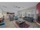 Open living area with hardwood floors and views into kitchen at 6336 San Gagano Ave, Las Vegas, NV 89131