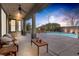 Relaxing patio area with pool and seating at 6336 San Gagano Ave, Las Vegas, NV 89131