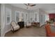 Bright sunroom with comfortable seating and plantation shutters at 6336 San Gagano Ave, Las Vegas, NV 89131