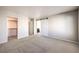 Spacious bedroom with large closet and sliding barn door at 6553 Churnet Valley Ave, Las Vegas, NV 89139