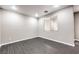 Empty spare bedroom with gray flooring and window blinds at 6553 Churnet Valley Ave, Las Vegas, NV 89139