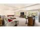 Basement featuring a pool table, wet bar and plenty of space for entertaining at 6595 Creekside Cellars Ct, Las Vegas, NV 89139