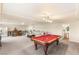 Basement featuring a pool table, wet bar, entertainment area and plenty of space at 6595 Creekside Cellars Ct, Las Vegas, NV 89139