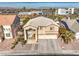 Two-story house with a two-car garage and landscaping at 686 Kentons Run Ave, Henderson, NV 89052