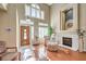 Bright living room with fireplace at 686 Kentons Run Ave, Henderson, NV 89052