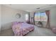 Spacious bedroom with Hello Kitty bedding and plenty of natural light at 7324 Tin Mine Ave, Las Vegas, NV 89179