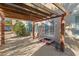 Patio with pergola and access to the house through double doors at 7611 Leybourne Ct, Las Vegas, NV 89131