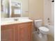 Clean bathroom with a toilet, shower, and vanity at 7611 Leybourne Ct, Las Vegas, NV 89131