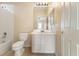 Bathroom with toilet, sink, and shower/tub combo at 7611 Leybourne Ct, Las Vegas, NV 89131