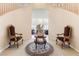 Entryway with ornate chairs and a round rug at 7611 Leybourne Ct, Las Vegas, NV 89131
