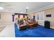 Home theater room with comfortable seating and projector at 7611 Leybourne Ct, Las Vegas, NV 89131