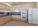 Well-equipped kitchen featuring double ovens and granite counters at 7611 Leybourne Ct, Las Vegas, NV 89131