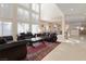 Spacious living room with high ceilings and a view to the dining room at 7611 Leybourne Ct, Las Vegas, NV 89131