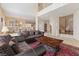 Elegant living room features a large window and access to the dining room at 7611 Leybourne Ct, Las Vegas, NV 89131