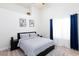 Modern bedroom featuring high ceilings, and elegant decor at 9109 Lazy Hill Cir, Las Vegas, NV 89117